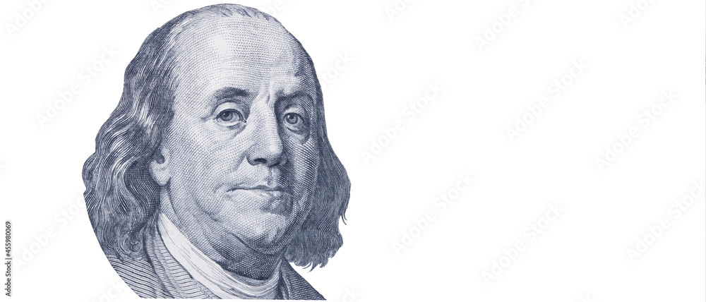 Obraz premium Benjamin Franklin face on one hundred US Dollar bill. United states money. Copy space.