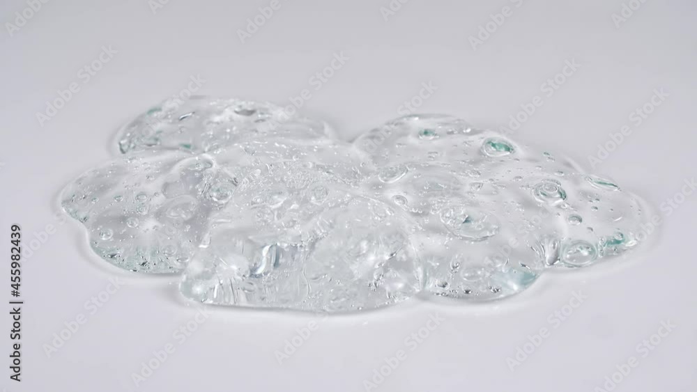Drops Transparent Cosmetic Gel Fluid With Molecule Bubbles. Macro Shot. High quality 4k footage Drops Transparent Cosmetic Gel Fluid With Molecule Bubbles. Macro Shot. High quality 4k footage