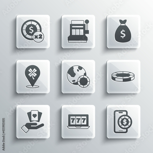 Set Online slot machine with jackpot, poker table game, Casino chips, Hand holding playing cards, clover, and Money bag icon. Vector