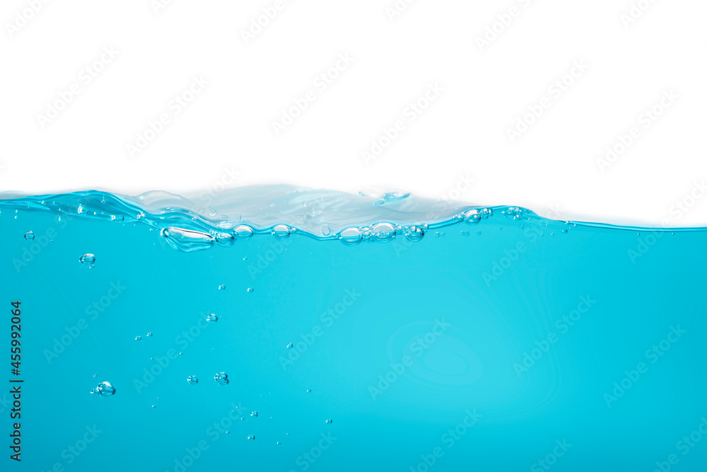 The crashing waves created air bubbles and scattered water. small bubbles float from the middle of the water to the surface blue liquid background The crashing waves created air bubbles and scattered water. small bubbles float from the middle of the water to the surface blue liquid background