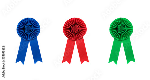 Red with blue award ribbons on isolated white background 