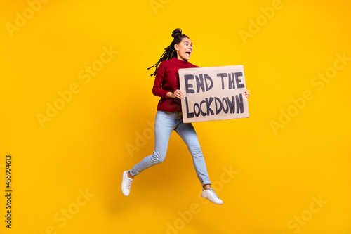 Full length body size photo woman keeping placard crazy stop quarantine isolated vibrant blue color background