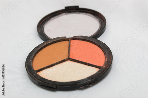 makeup, compact powder for the face on a white background.