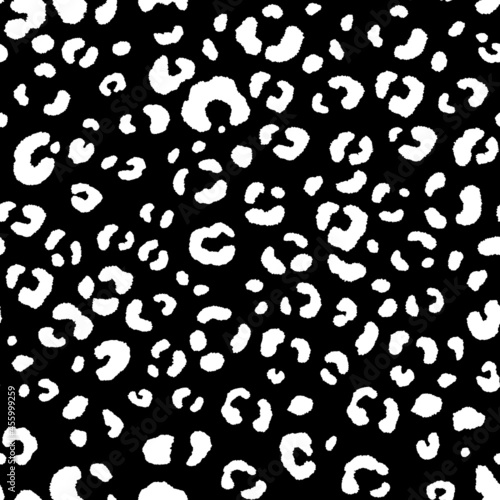 Abstract modern leopard seamless pattern. Animals trendy background. Black and white decorative vector illustration for print, card, postcard, fabric, textile. Modern ornament of stylized skin