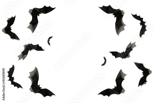 Black paper bat on a white background. Halloween concept. With a hard black shadow.