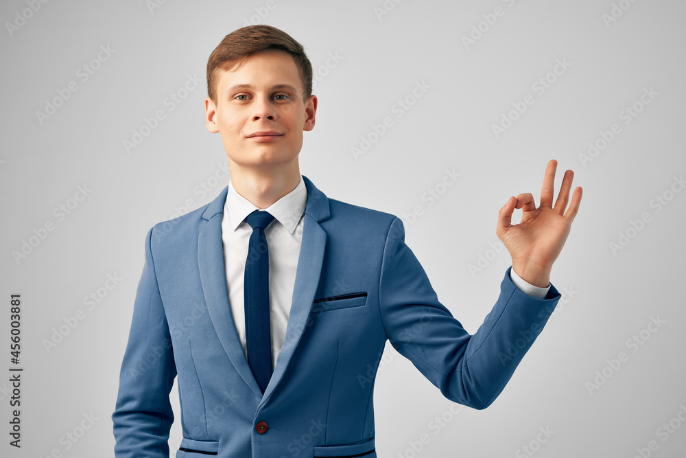 Cheerful business man in suit official office work posing Cheerful business man in suit official office work posing