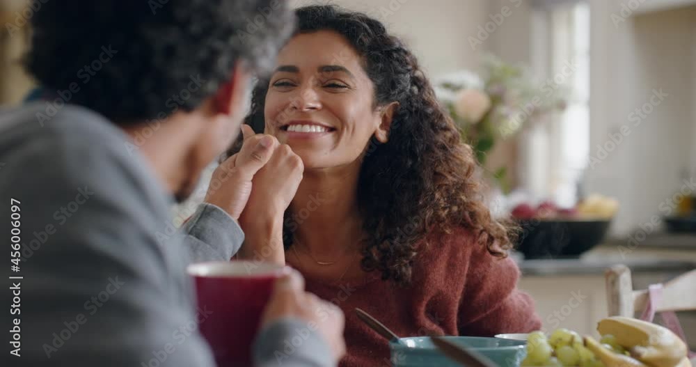 beautiful happy woman chatting to husband at home enjoying conversation holding hands in kitchen at breakfast beautiful happy woman chatting to husband at home enjoying conversation holding hands in kitchen at breakfast