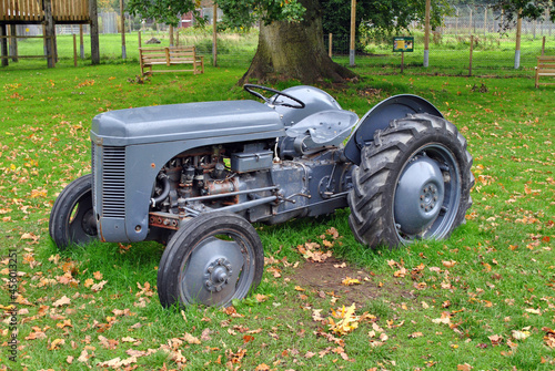 Close Up of Old Grey Ferguson TE 20 Tractor in  Grassy Field photo