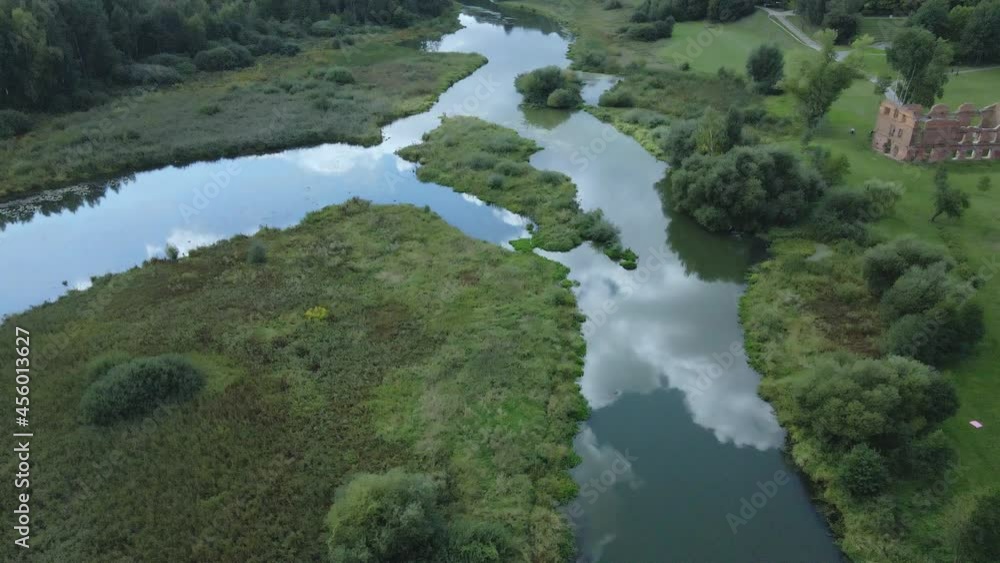 Park area. A winding river with water lilies. Swampy area. Aerial photography. Park area. A winding river with water lilies. Swampy area. Aerial photography.