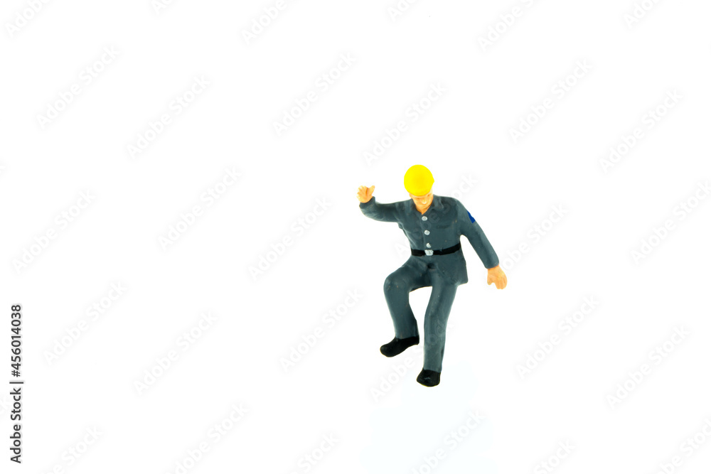 Miniature people engineer worker construction concept on white background Miniature people engineer worker construction concept on white background