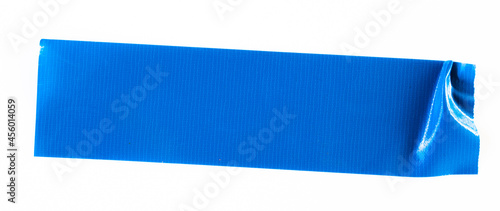 Blue tape on white background. Torn horizontal and different size blue sticky tape, adhesive pieces. photo