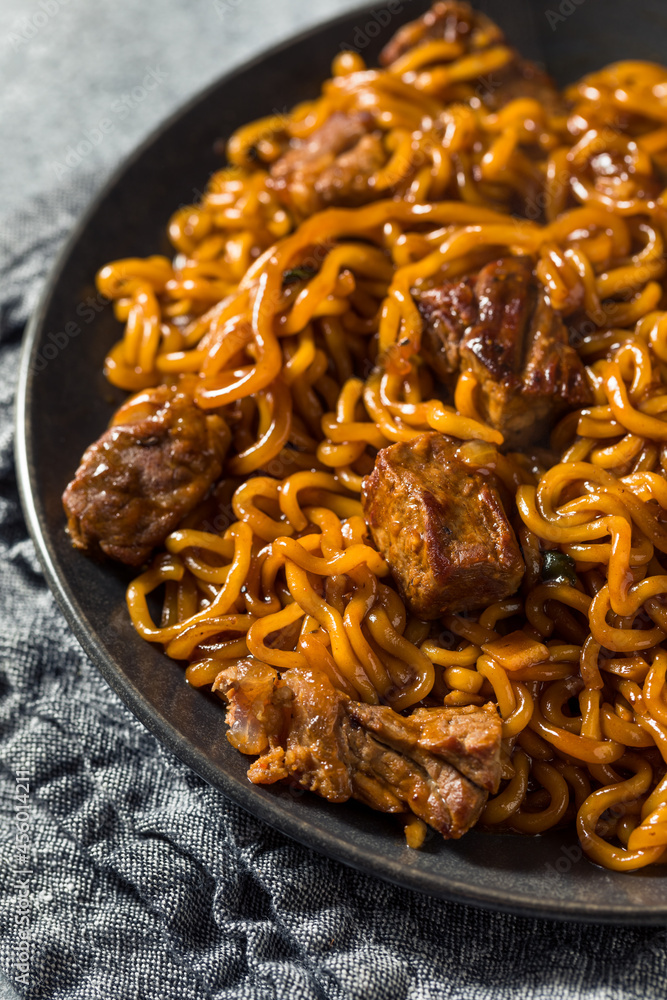 Fototapeta premium Homemade Trendy Korean Jjapaguri Noodles with Beef
