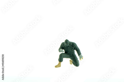 Miniature people office, worker, police and thief concept in variety action on white background