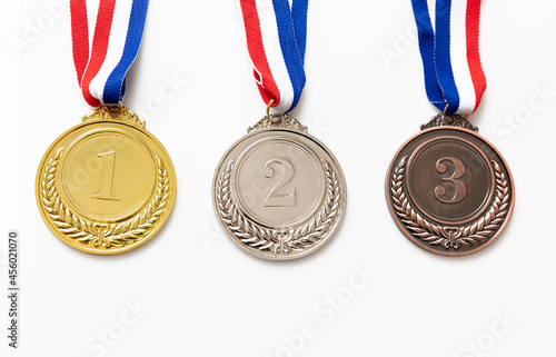 Fototapeta Gold, silver and bronze medals set on white background