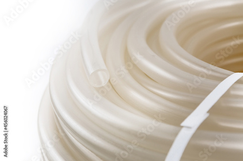 A rubber hose wrapped in a bobbin and fastened with a plastic lock