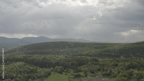 Aerial dolly pan of mountains and nature