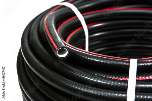 A rubber hose wrapped in a bobbin and fastened with a plastic lock