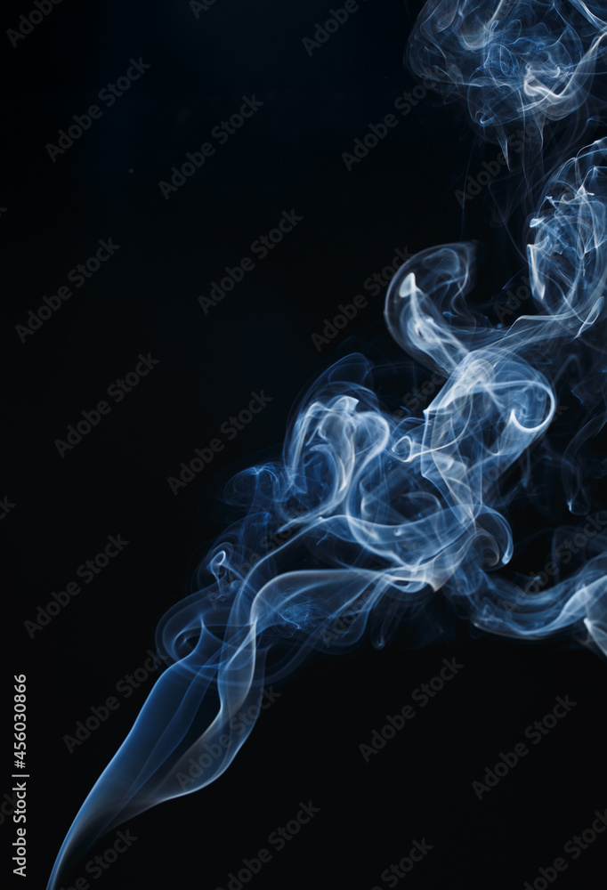 Smoke floating on dark background Smoke floating on dark background