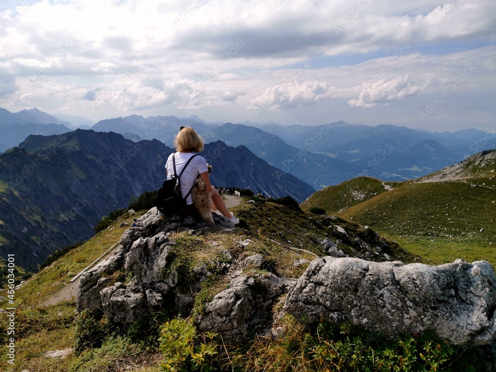 hiker on the top of mountain hiker on the top of mountain