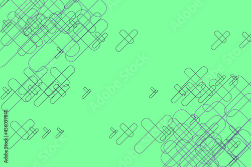 Set of light elements forming a diagonal design on a green background.