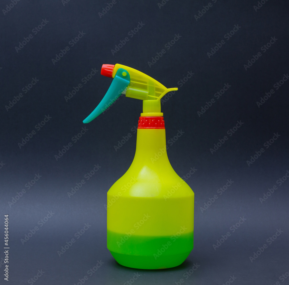 Yellow plant sprayer isolated on black background - Image Yellow plant sprayer isolated on black background - Image