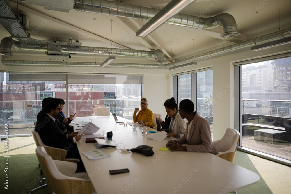 Business people in conference room meeting Business people in conference room meeting