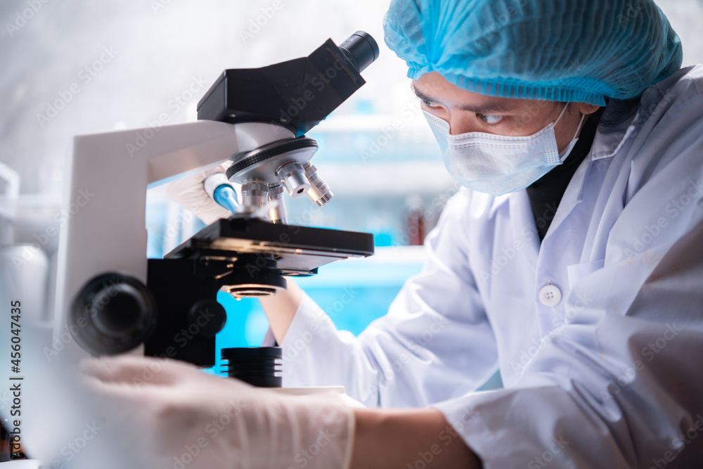microscope in a medical research lab or science laboratory, study for making vaccine to protection a coronavirus COVID-19 microscope in a medical research lab or science laboratory, study for making vaccine to protection a coronavirus COVID-19