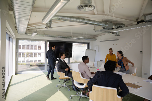 Business people gathering in conference room meeting