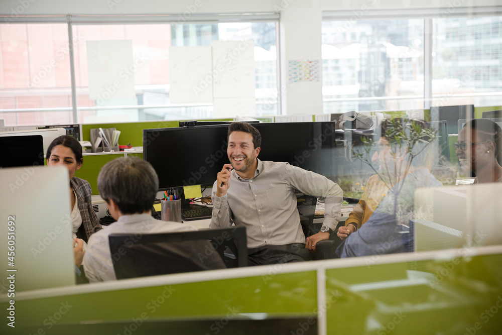 Fototapeta premium Business people talking in open plan office
