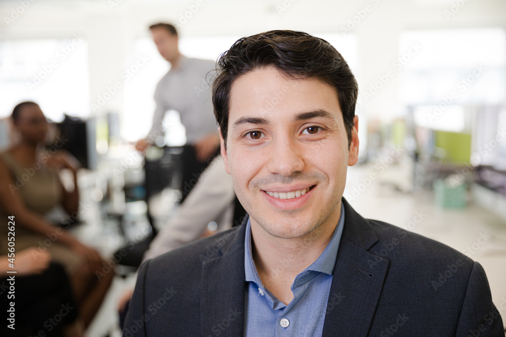 Portrait of smiling businessman in conference room Portrait of smiling businessman in conference room