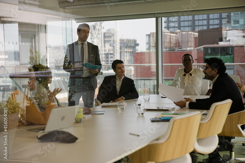 Businessman leading conference room meeting