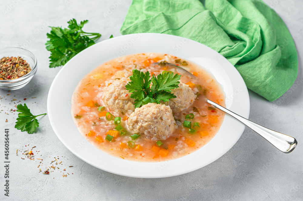 Soup with turkey meatballs and rice with fresh herbs. Soup with turkey meatballs and rice with fresh herbs.