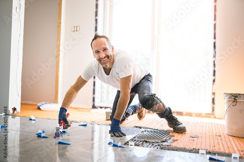 nice handyman install tile on the floor