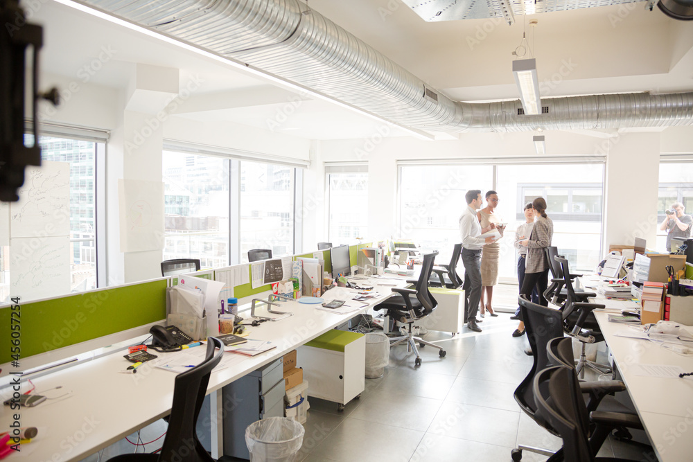 Fototapeta premium Business people talking in open plan office