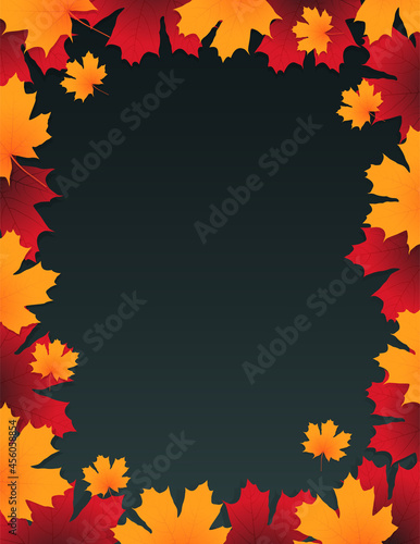 Frame made from autumn leaves. Maple leaf frame. Yellow and red leaves on a gray background. Autumn background with place for text.