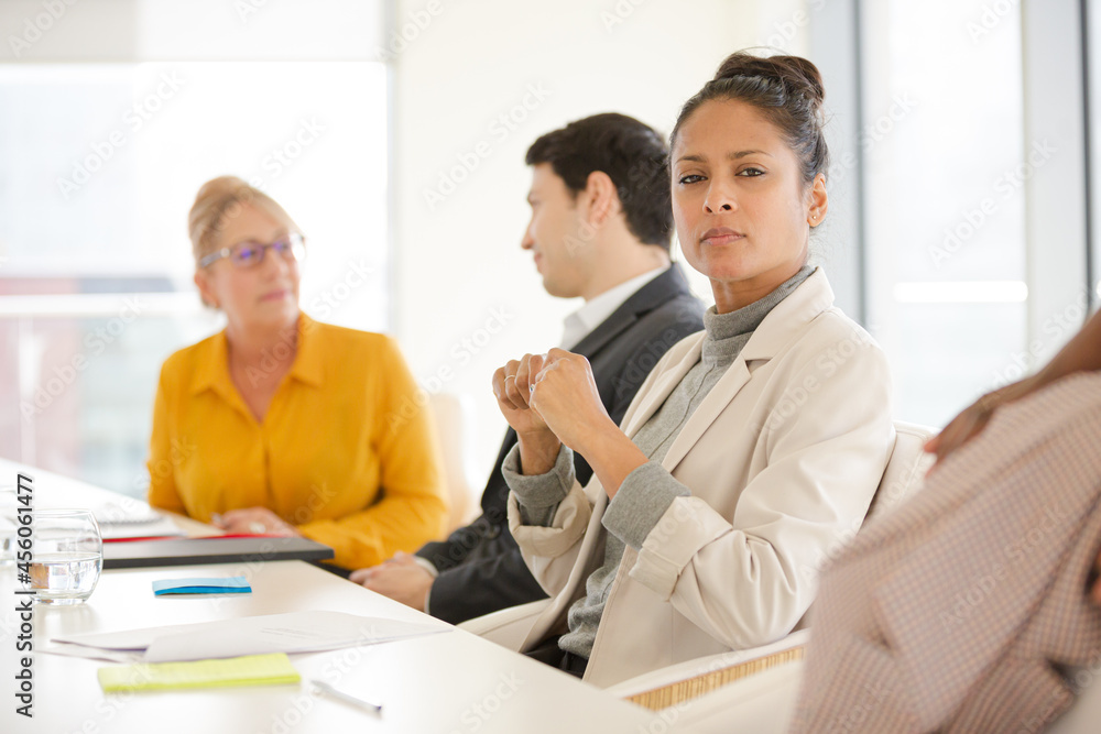 Portrait of smiling businesswoman in conference room meeting Portrait of smiling businesswoman in conference room meeting