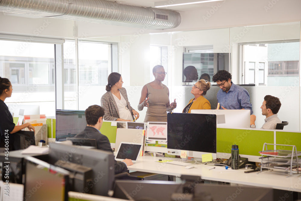 Fototapeta premium Business people talking in open plan office