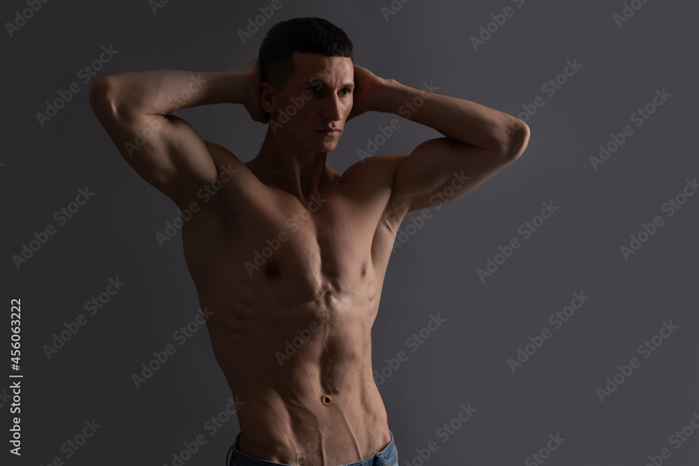 Fototapeta premium Shirtless and bare-chested. Shirtless man grey background. Fit guy with muscular torso