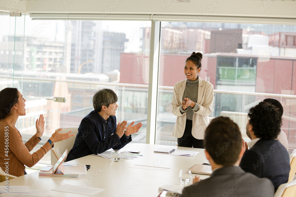 Businesswoman leading conference room meeting Businesswoman leading conference room meeting