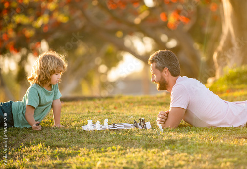 fathers day. happy family. parenthood and childhood. checkmate. spending time together.