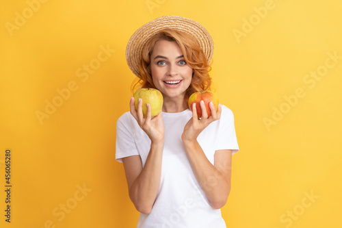 Wallpaper Mural cheerful redhead girl in straw hat hold apple, vitamin Torontodigital.ca
