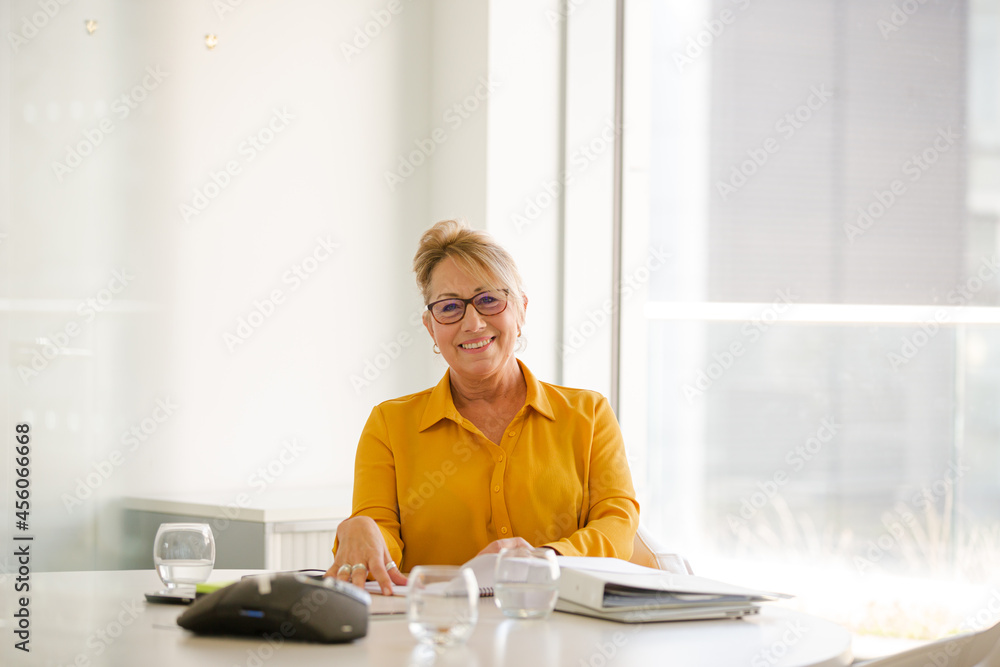 Portrait of confident businesswoman in office Portrait of confident businesswoman in office