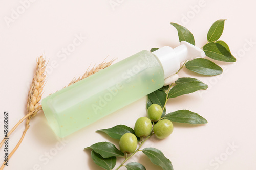 Natural cosmetic products on a beige background. Cosmetic bottle mockup.