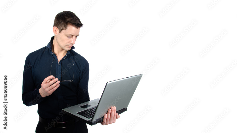 Funny handsome man with laptop. White background. Funny handsome man with laptop. White background.