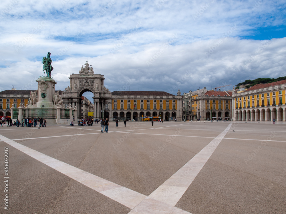 Lisbon Praça do Comércio buildings and central statue with Rua Augusta arch in background