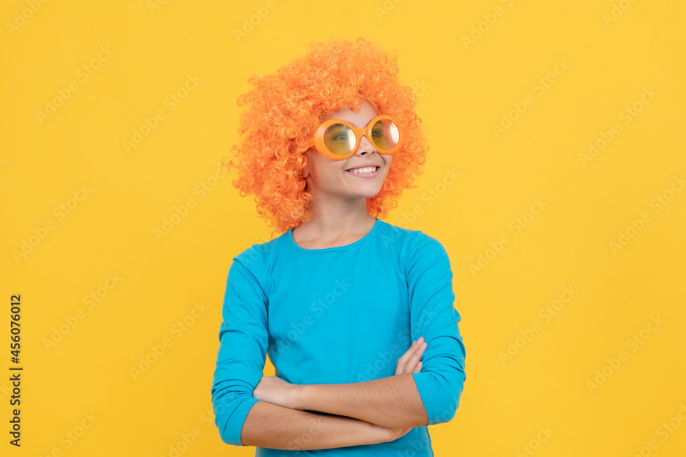 cheerful selfish child girl in curly wig and party glasses, selfishness cheerful selfish child girl in curly wig and party glasses, selfishness