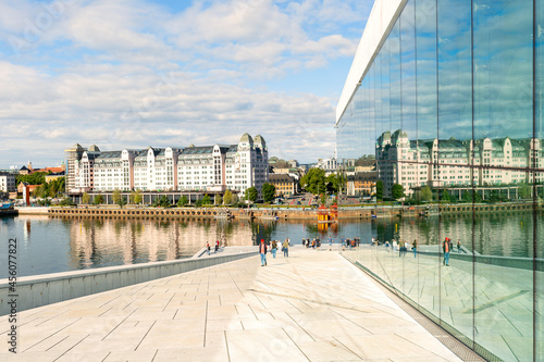 The Oslo Opera House or Operahuset, the home of the Norwegian National Opera and Ballet, and the national opera theater; the Oslofjord coast view photo