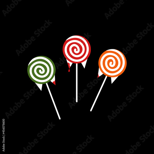 Colorful lollipop isolated on the black background