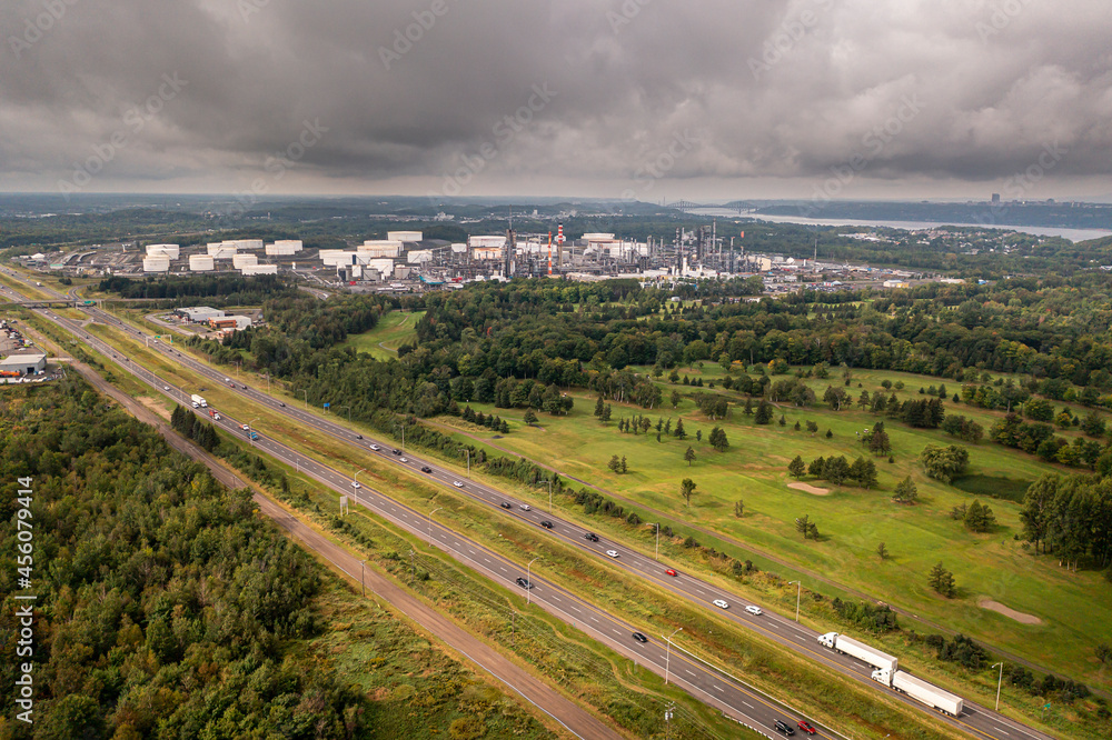 Highway from the air with golf course and refinery in the background