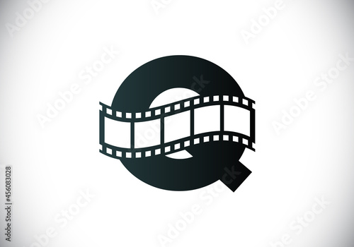 Initial Q monogram alphabet incorporated with film reel. Video and movie logo concept. Font emblem. Logo for the entertainment business and company identity